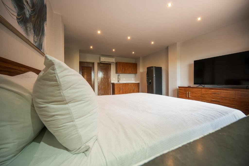 Postel nebo postele na pokoji v ubytování Casa de los Sueños Hotel Boutique