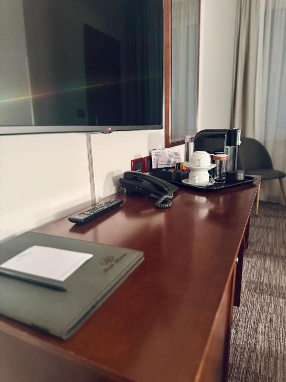 TV a/nebo společenská místnost v ubytování Hotel Marina