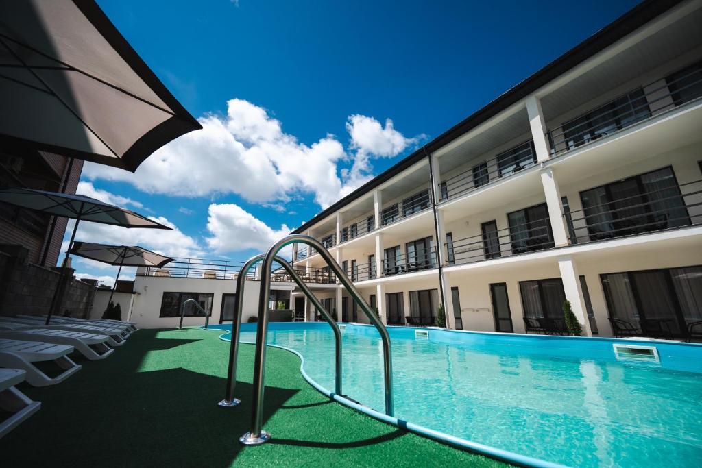 Фотография из галереи Міні-готель TURIN з басейном на Кароліно-Бугазі в Каролино-Бугазе