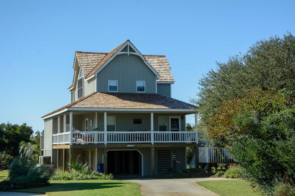 a large house with a wrap around porch at Baymeadow 10 in Nags Head