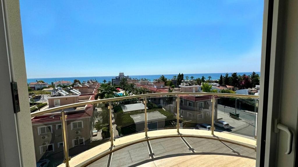 a view of a city from a balcony at Two Bedrooms LongBeach SeaView Escape in Paralimni