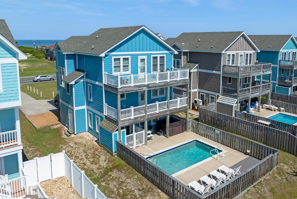 an aerial view of a house with a swimming pool at Carolinian in Nags Head