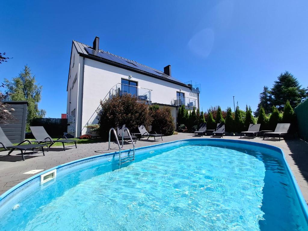 Bazén v ubytovaní Martinus Apartments alebo v jeho blízkosti