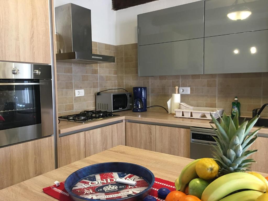Kuchyň nebo kuchyňský kout v ubytování Holiday Home Rasopas