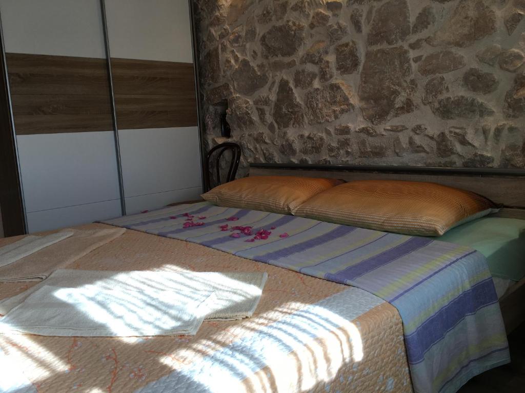 Postel nebo postele na pokoji v ubytování Holiday Home Rasopas