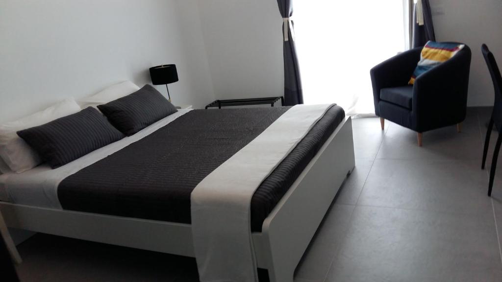 A bed or beds in a room at B&B Roda Barocco