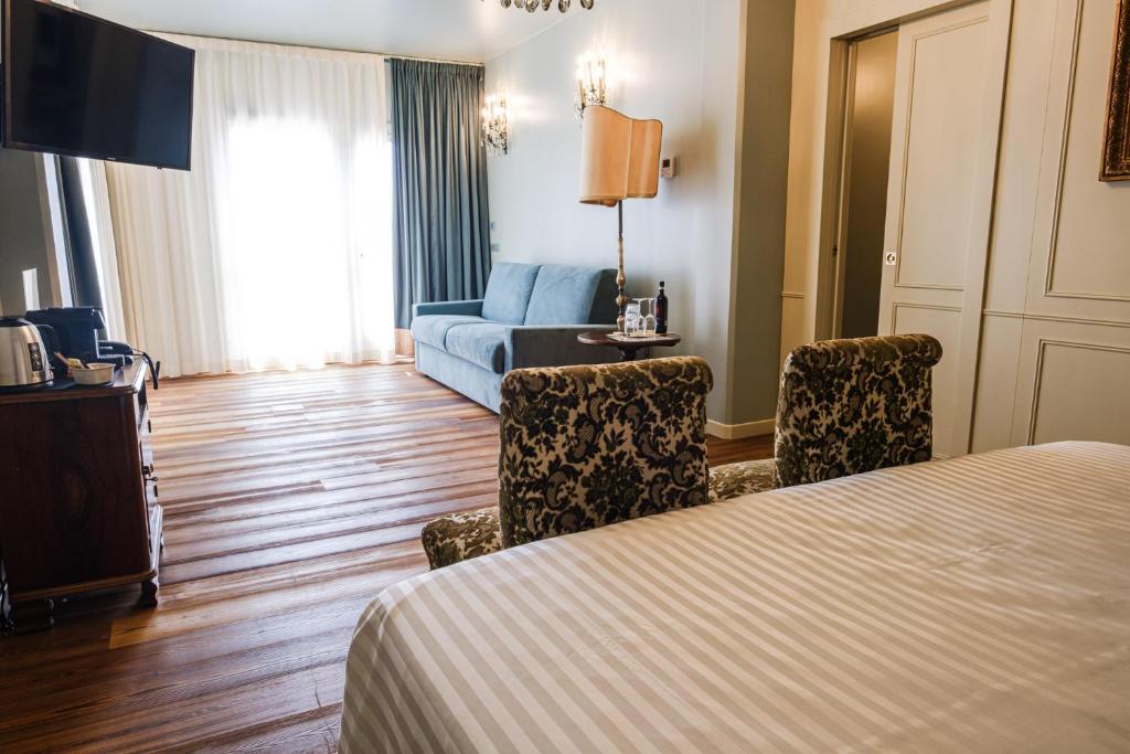 Postel nebo postele na pokoji v ubytování Agriturismo Le Volpi