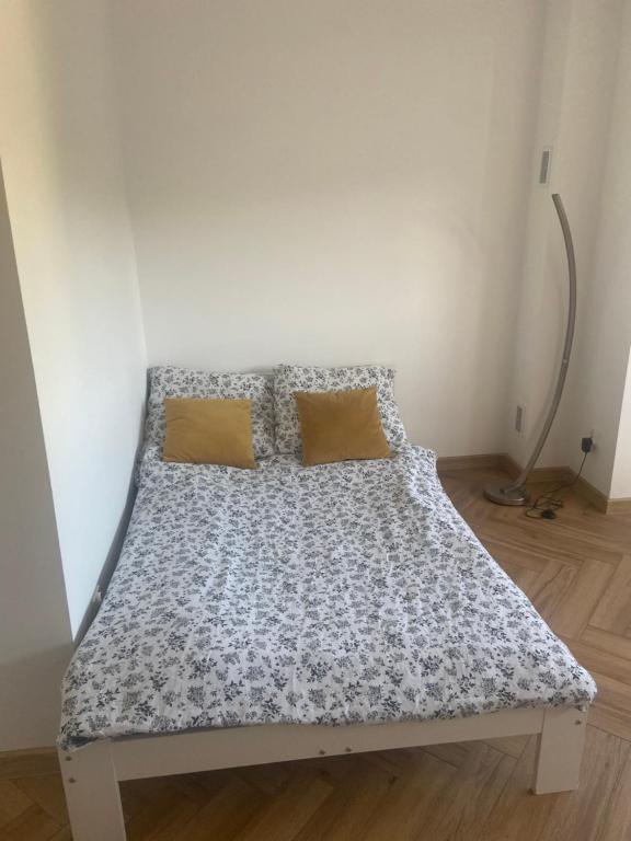 Postel nebo postele na pokoji v ubytování Apartament dwa pokoje