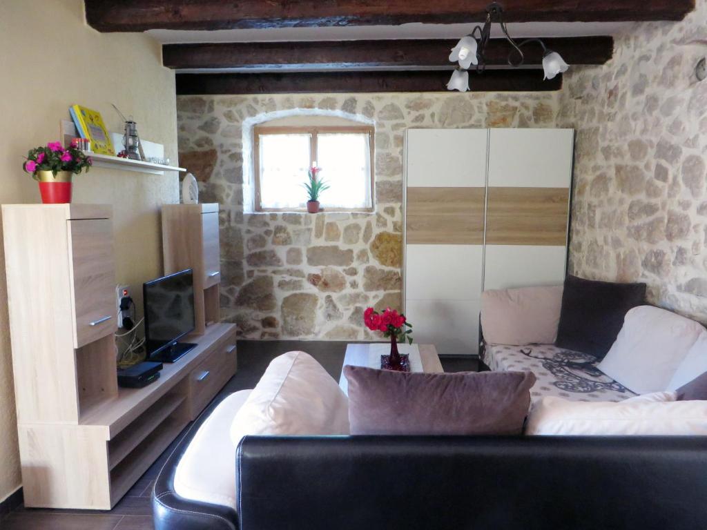 Posezení v ubytování Holiday Home Rasopas