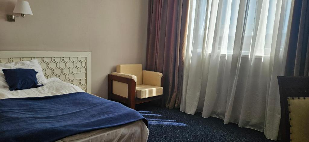 Letto o letti in una camera di Cruise Hotel