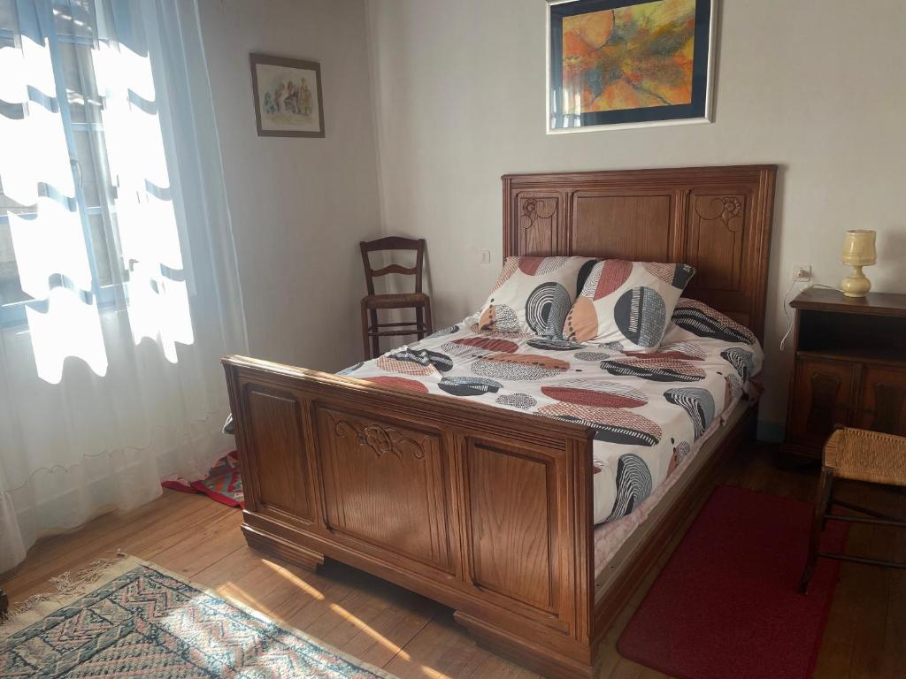 Postel nebo postele na pokoji v ubytování Chez Christian