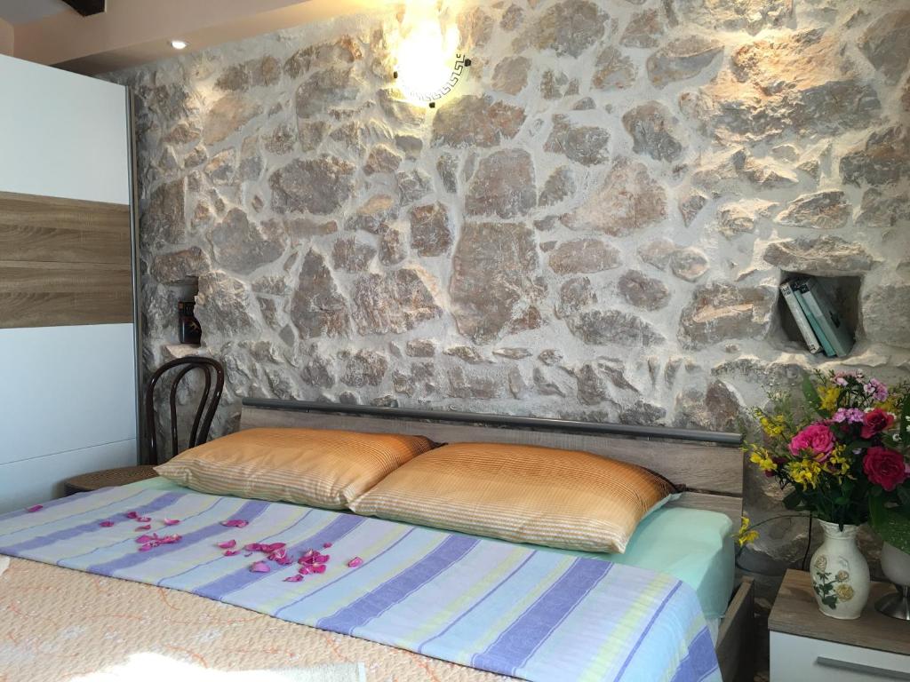 Postel nebo postele na pokoji v ubytování Holiday Home Rasopas