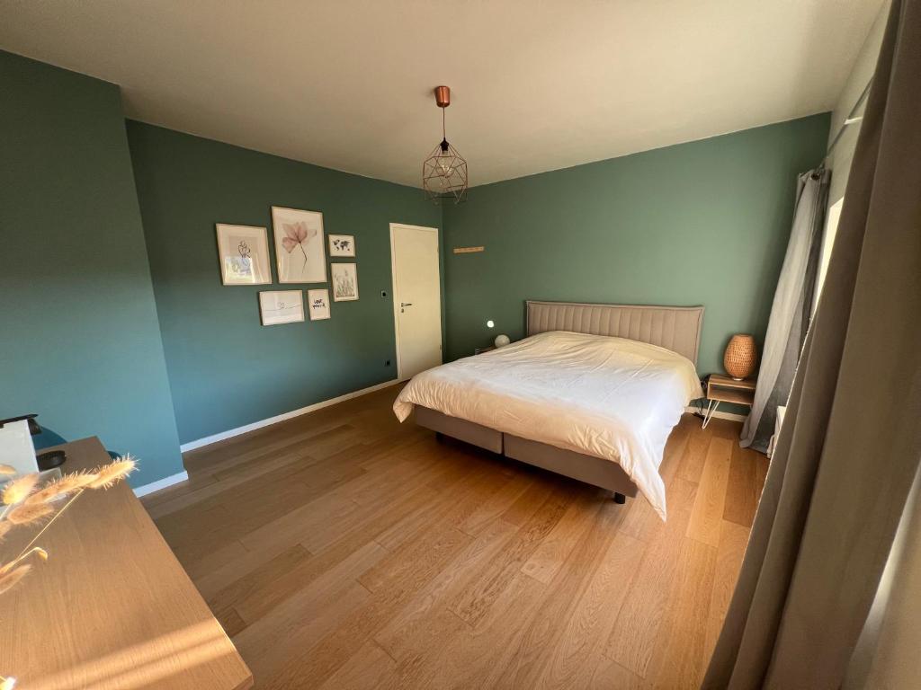 Ένα ή περισσότερα κρεβάτια σε δωμάτιο στο Villa Romy - à 2 pas du circuit de Spa-Francorchamps