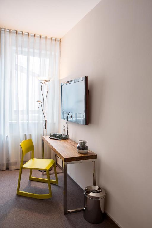 TV a/nebo společenská místnost v ubytování Hotel Anna