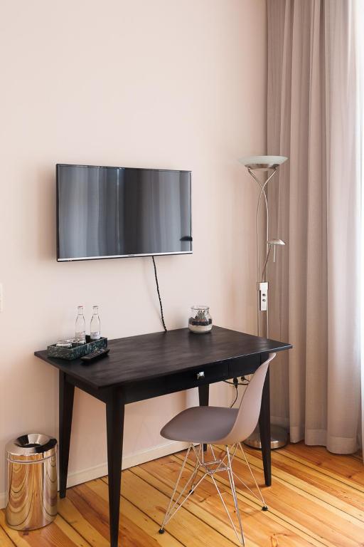 TV a/nebo společenská místnost v ubytování Hotel Anna