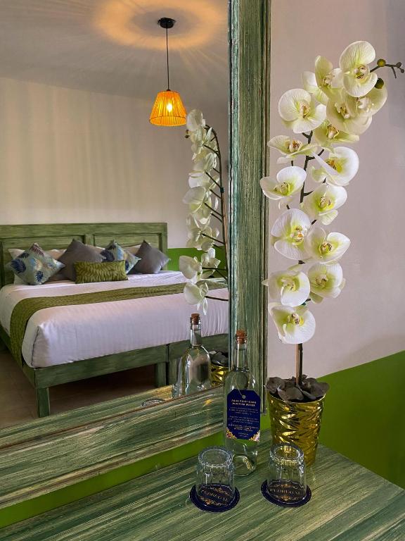 Postel nebo postele na pokoji v ubytování Hotel Pedregal