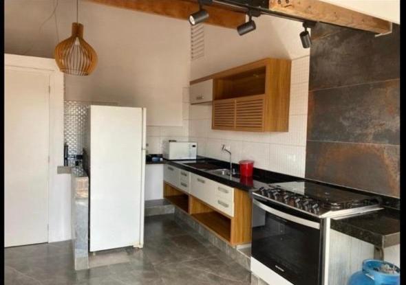 Η κουζίνα ή μικρή κουζίνα στο Apartamento Alvinopolis