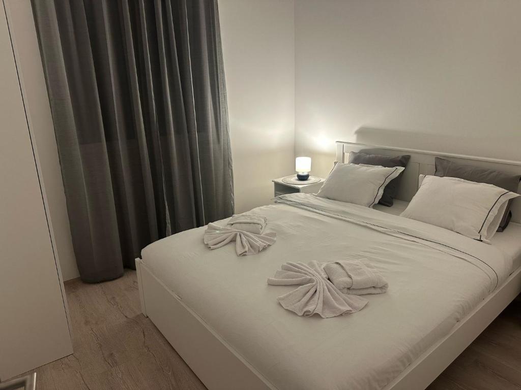 Postel nebo postele na pokoji v ubytování Apt 2- Sokobanjica apartmani