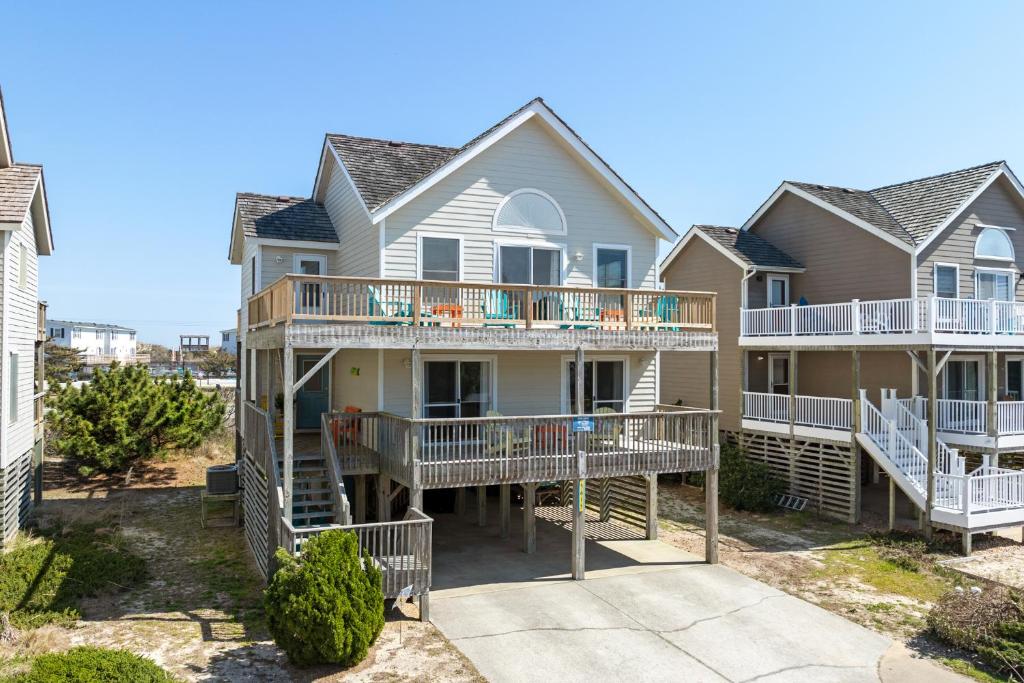 a row of houses with balconies on them at Harrells Retreat in Nags Head