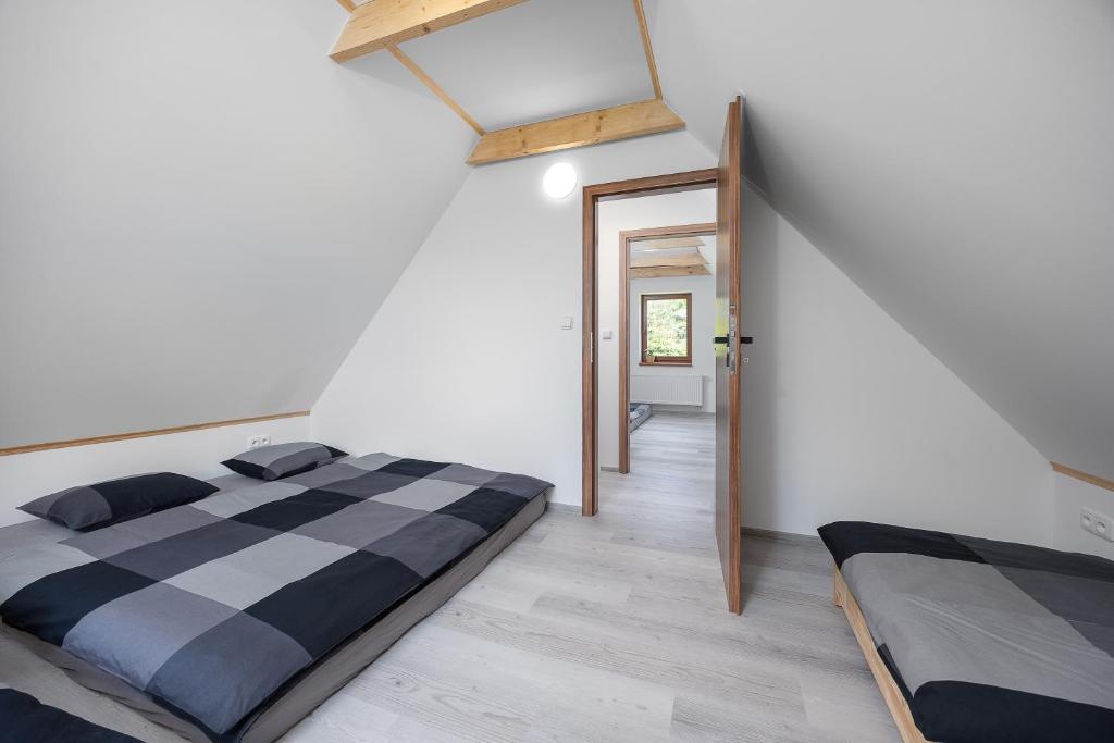 Postel nebo postele na pokoji v ubytování MERTLIN Resort