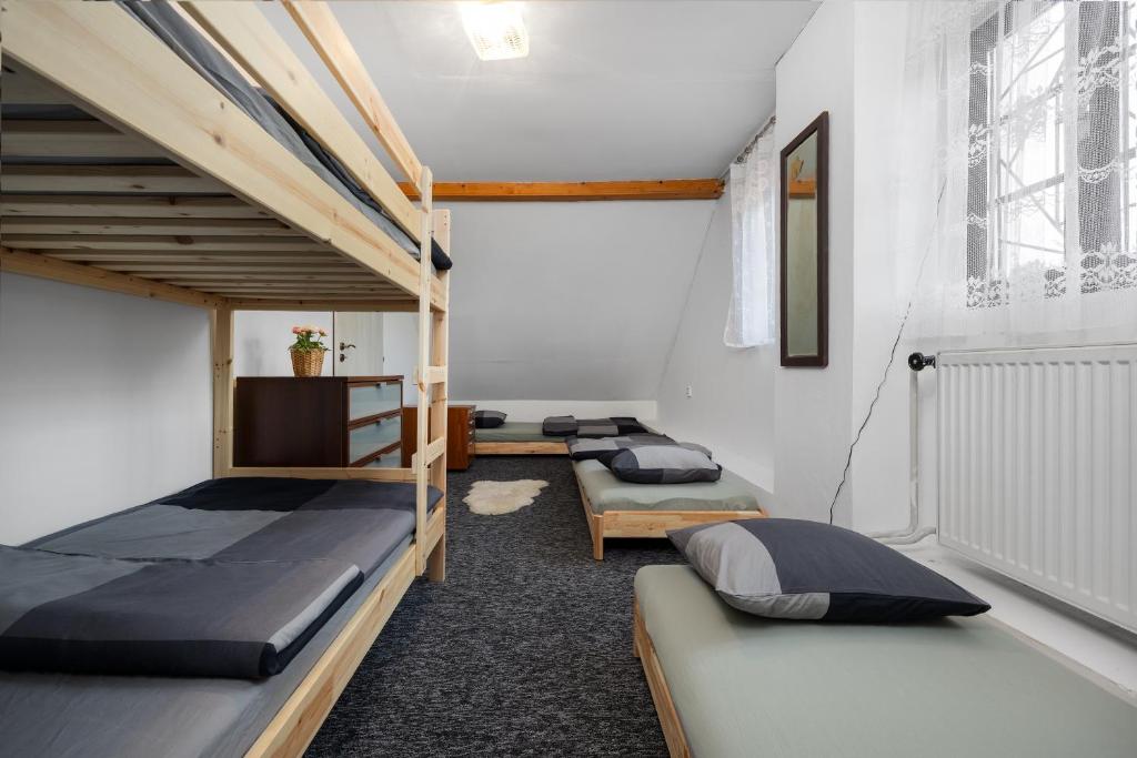 Postel nebo postele na pokoji v ubytování MERTLIN Resort
