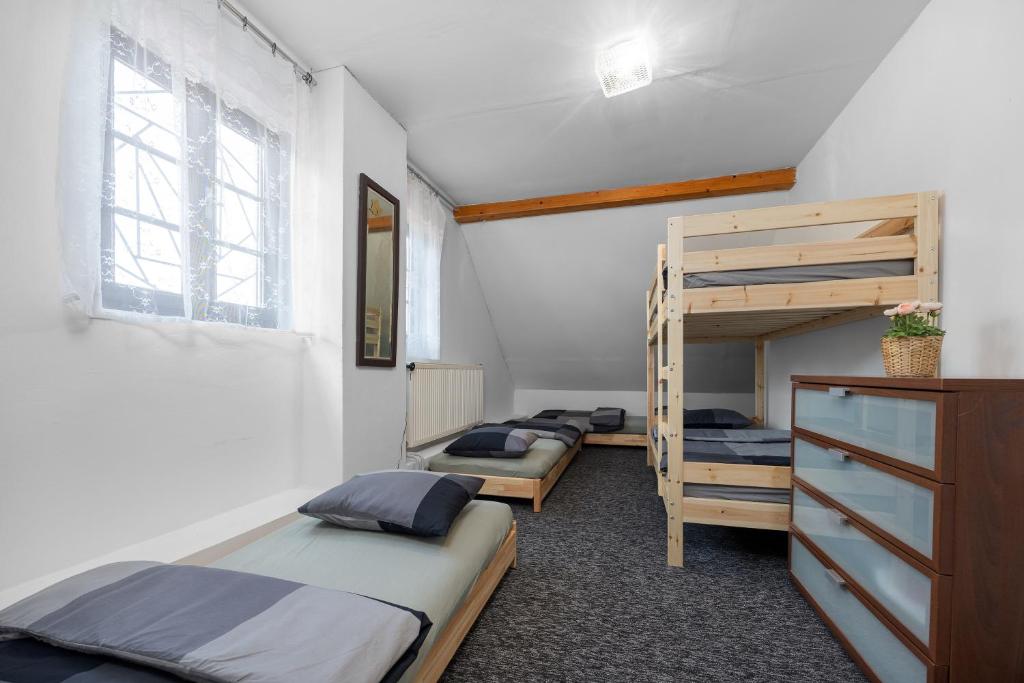 Postel nebo postele na pokoji v ubytování MERTLIN Resort