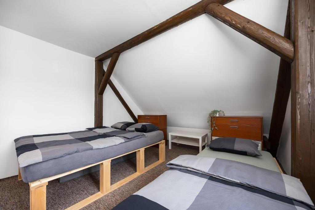 Postel nebo postele na pokoji v ubytování MERTLIN Resort