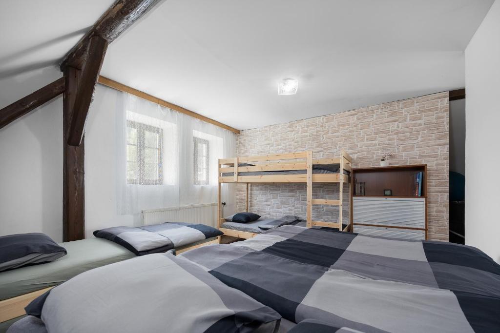 Postel nebo postele na pokoji v ubytování MERTLIN Resort