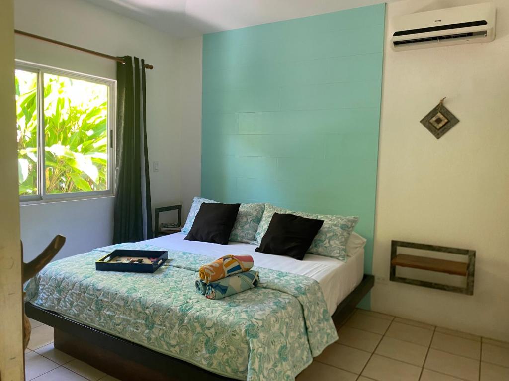 Postel nebo postele na pokoji v ubytování Cote Pacific Casitas