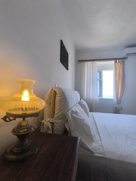 Postel nebo postele na pokoji v ubytování Q Bay Apartments