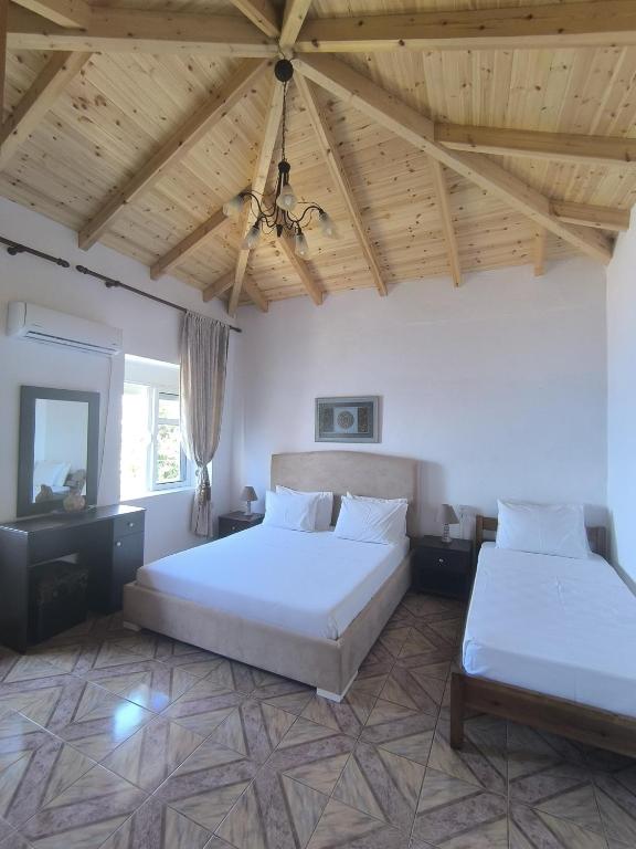 Postel nebo postele na pokoji v ubytování Q Bay Apartments