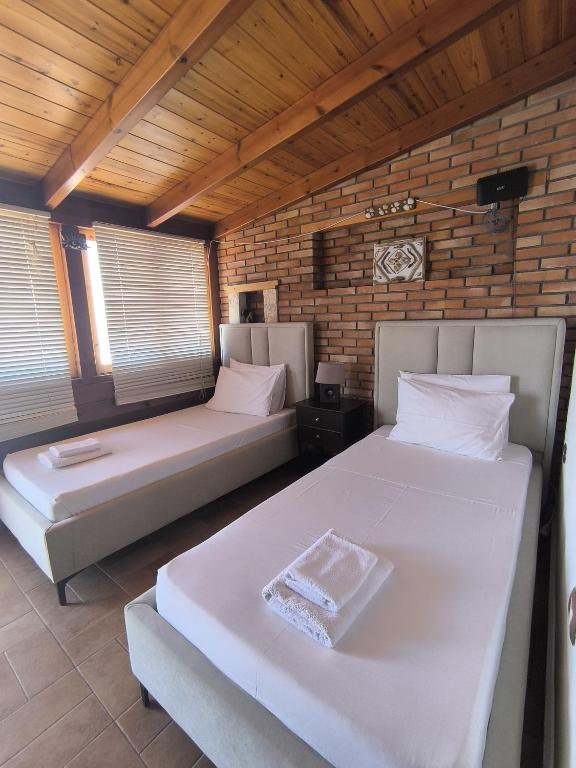 Postel nebo postele na pokoji v ubytování Q Bay Apartments