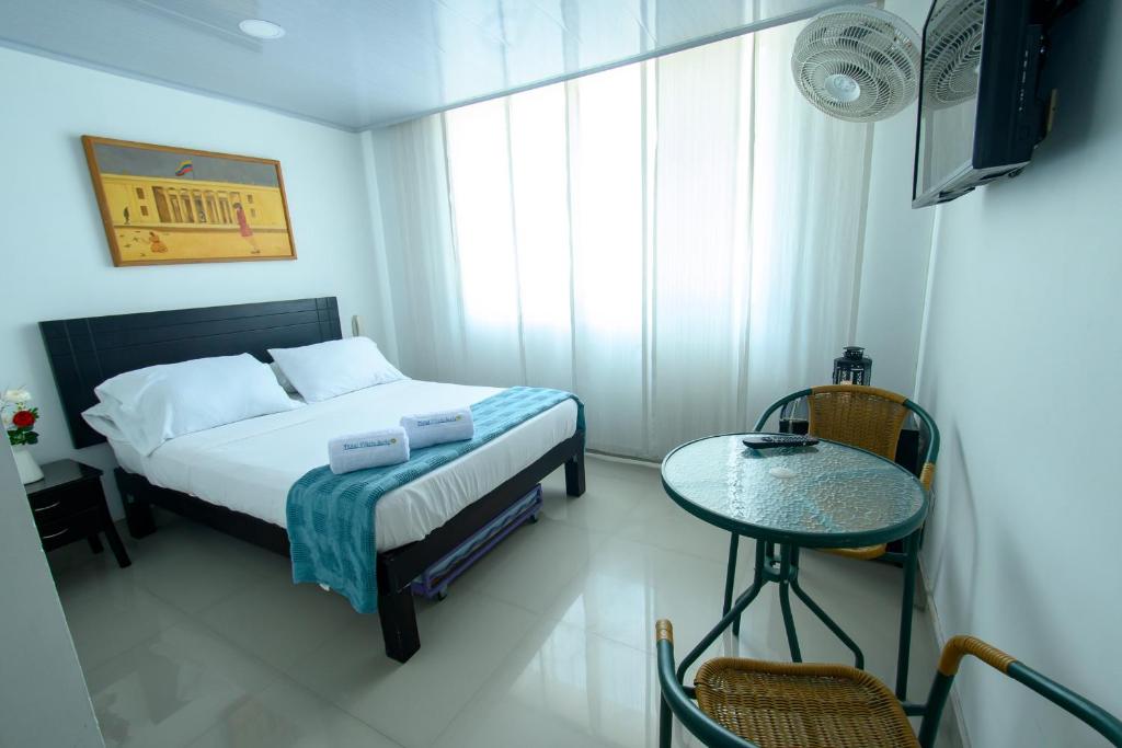 Postel nebo postele na pokoji v ubytování Hotel Villeta Suite SPA