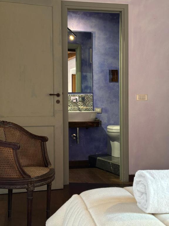 Posteľ alebo postele v izbe v ubytovaní Gratteri Stone Jacuzzi House