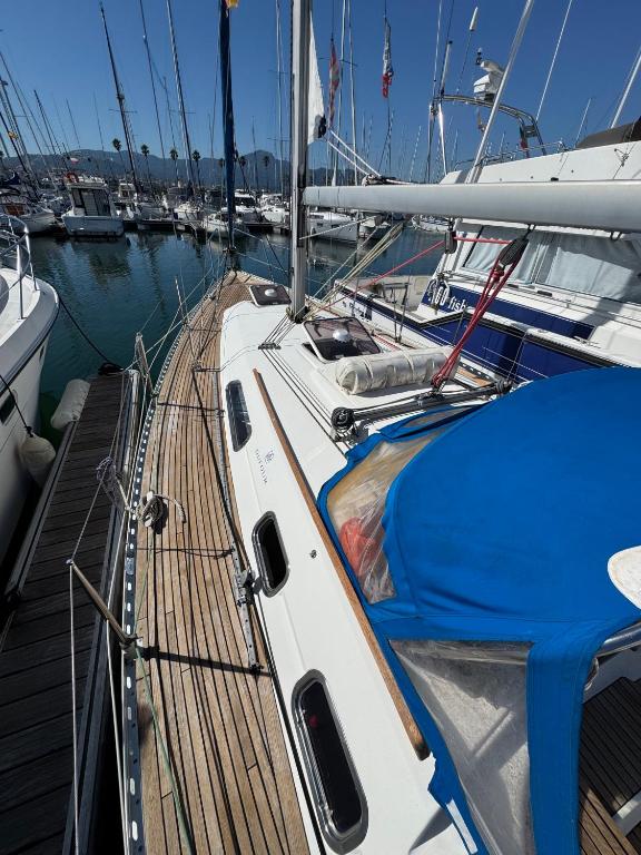 a boat docked in a marina with other boats at Voilier Dufour Classic 35 in Hendaye