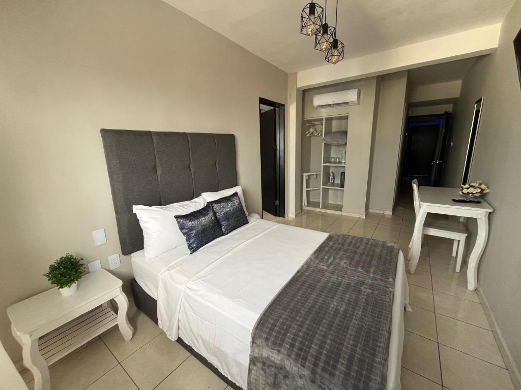 Postel nebo postele na pokoji v ubytování Hotel Venedik