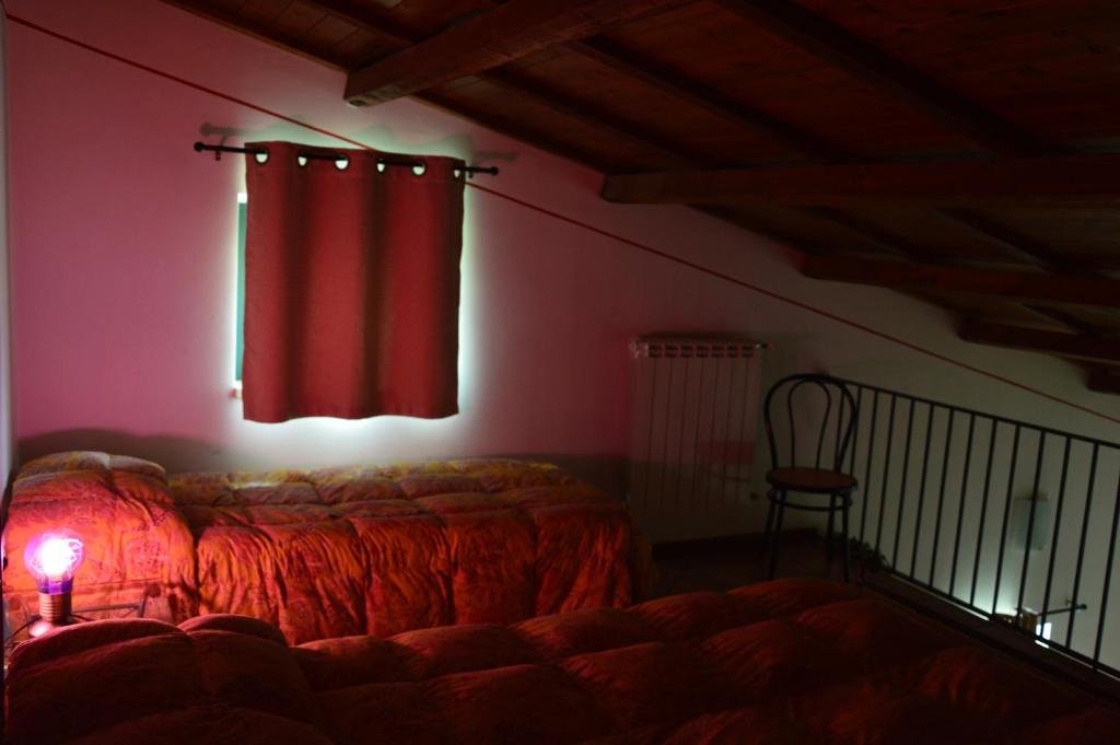 Postel nebo postele na pokoji v ubytování R&B Il Parco