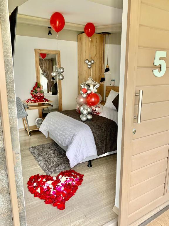 Postel nebo postele na pokoji v ubytování Asher Hospedaje y Turismo