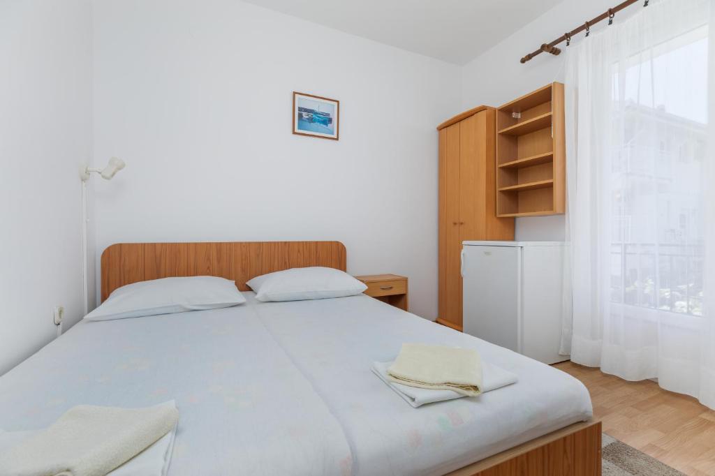 Postel nebo postele na pokoji v ubytování Apartments by the sea Podaca, Makarska - 516