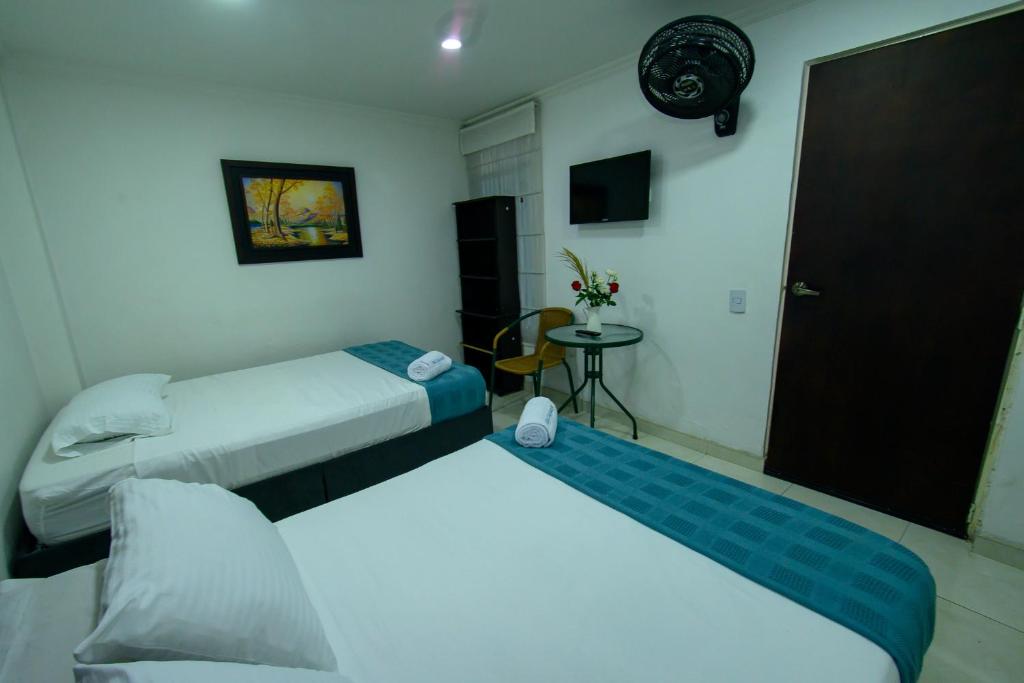Postel nebo postele na pokoji v ubytování Hotel Villeta Suite SPA