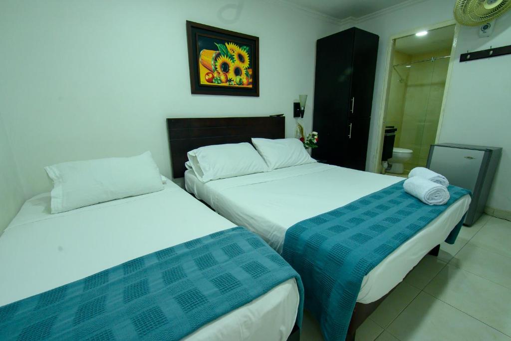 Postel nebo postele na pokoji v ubytování Hotel Villeta Suite SPA