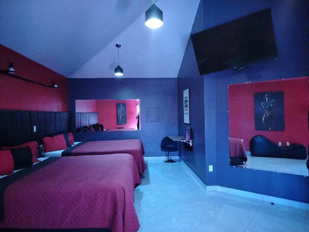 Postel nebo postele na pokoji v ubytování Lizvan Hotel-Motel