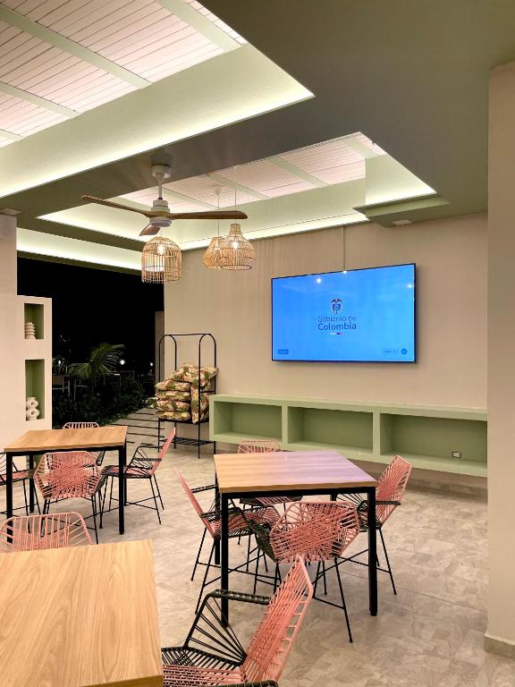 TV a/nebo společenská místnost v ubytování Ivanna Hotel Campestre