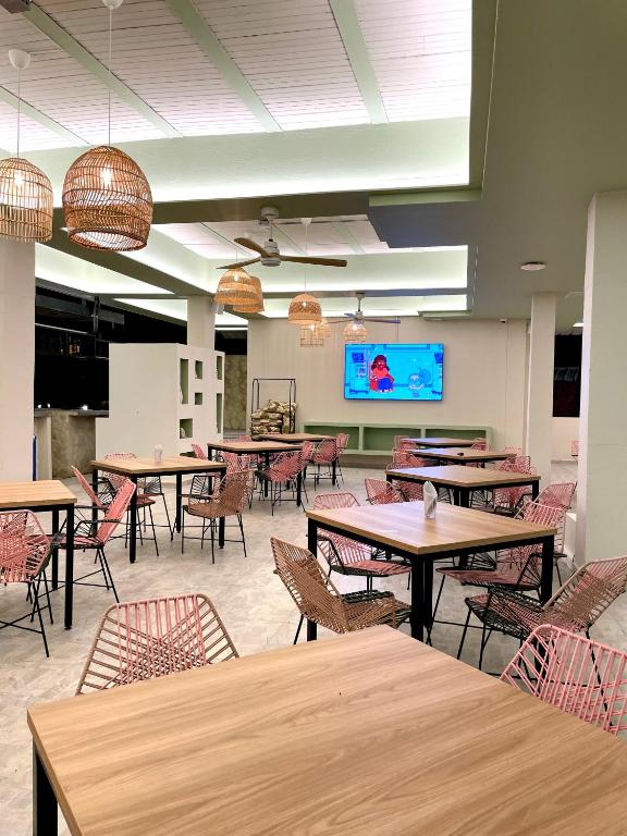 TV a/nebo společenská místnost v ubytování Ivanna Hotel Campestre