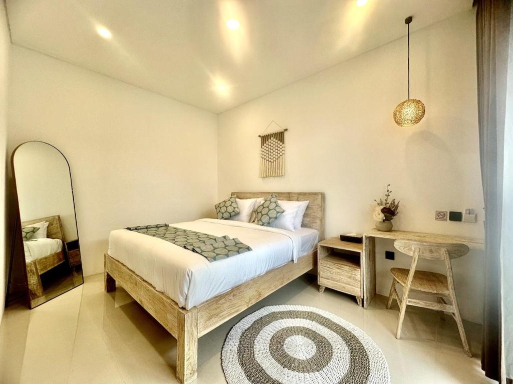Ένα ή περισσότερα κρεβάτια σε δωμάτιο στο Cactaceae Villa Ungasan