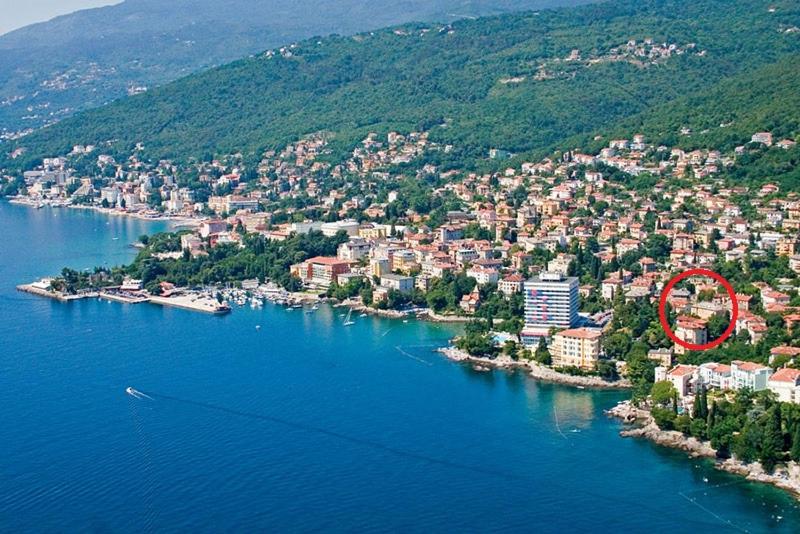 an aerial view of a town on a lake at Opatija Apartment in Opatija