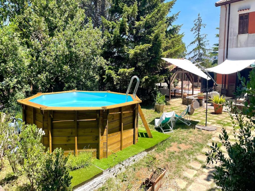 a pool in the backyard of a house at Villa in Cefalù with Pool and Forest Retreat in Castelbuono