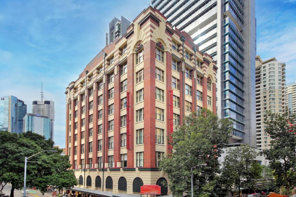 a tall building in the middle of a city at Royal Albert Hotel in Brisbane