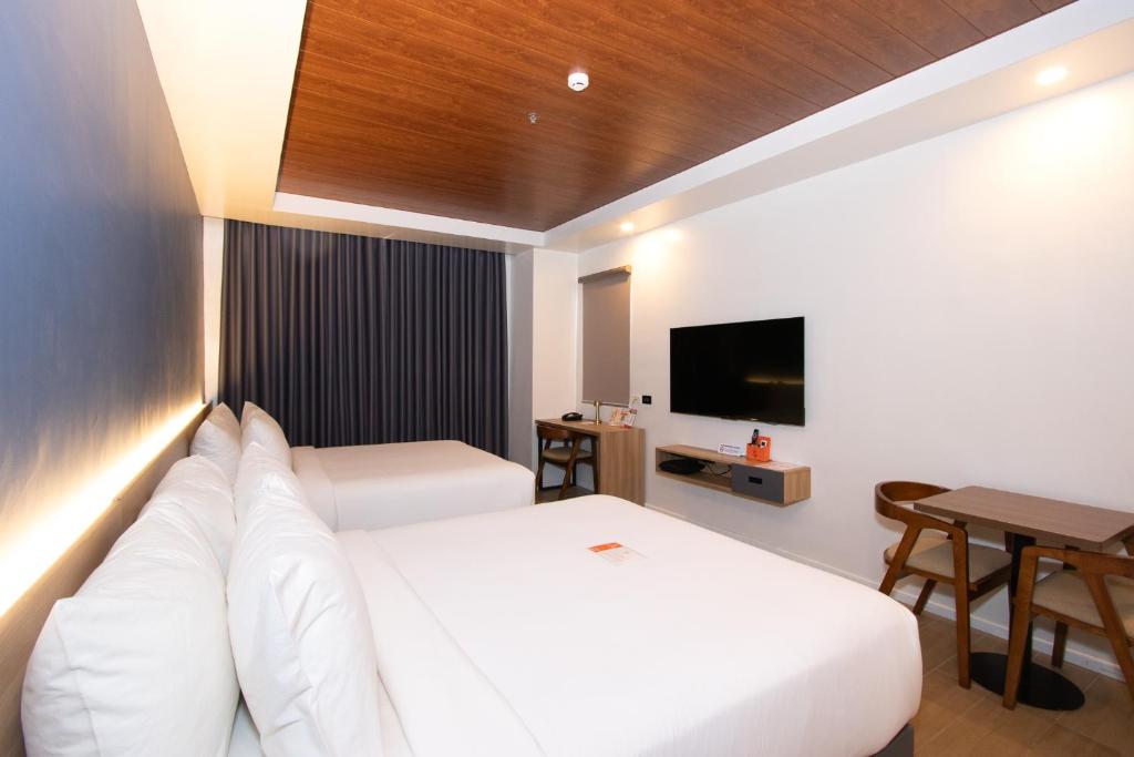 Postel nebo postele na pokoji v ubytování Levo Hotel