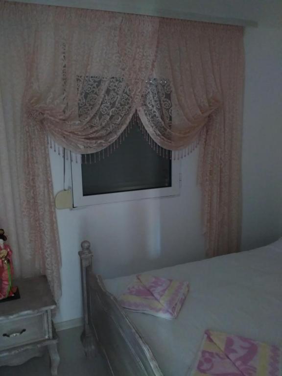 A bed or beds in a room at Villa Avdira